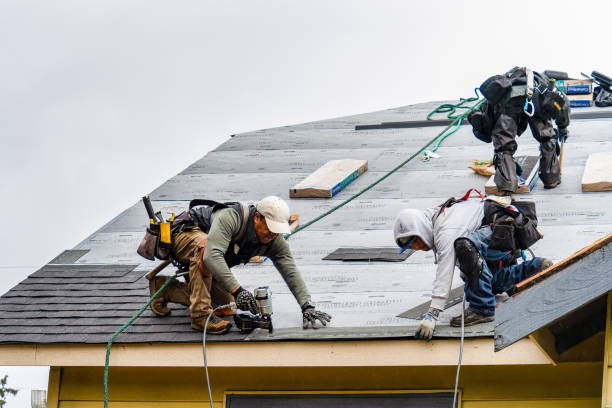 Professional Roofing technician working in Bellmore, NY